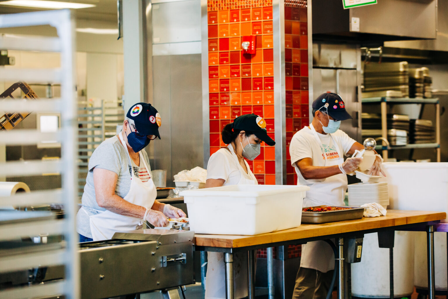 Volunteers working in Open Arms kitchen.