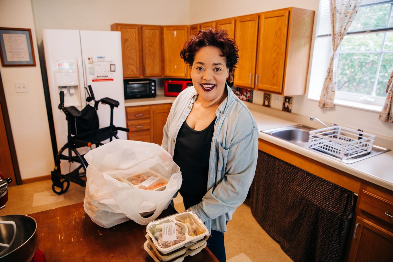 Client Patricia in kitchen.