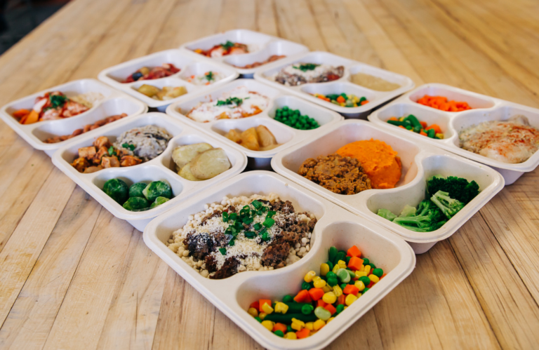 Meal trays on table.